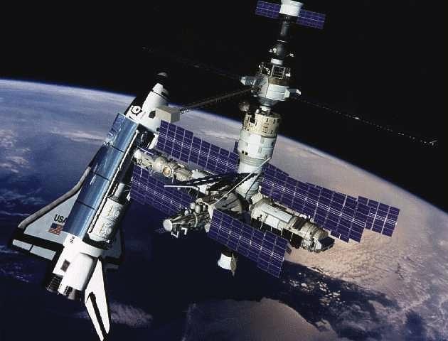 The US Space Shuttle docks with Russia's Mir space station